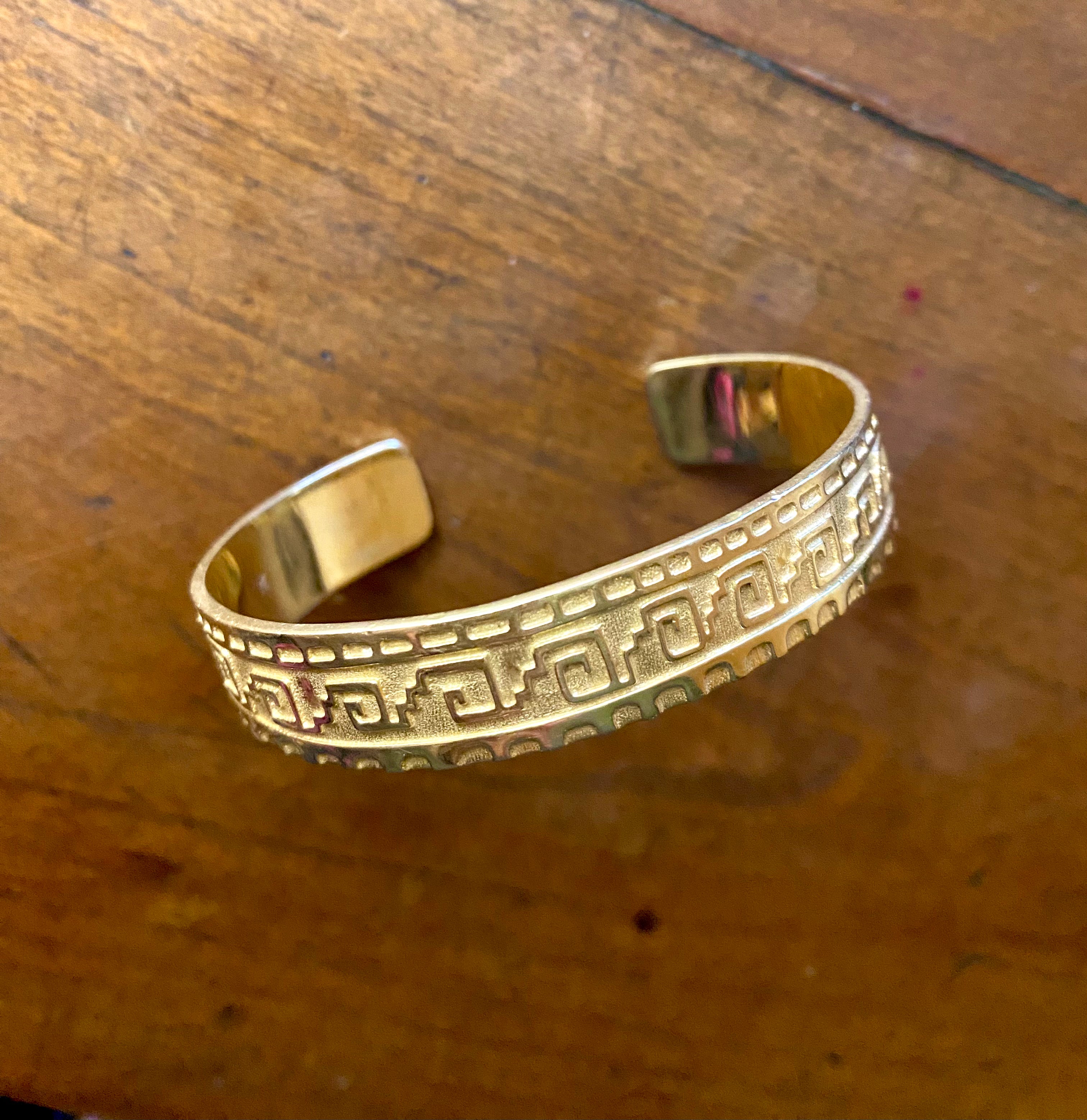 Gold Zapotec bangle by fine jewelry designer Jade Jagger