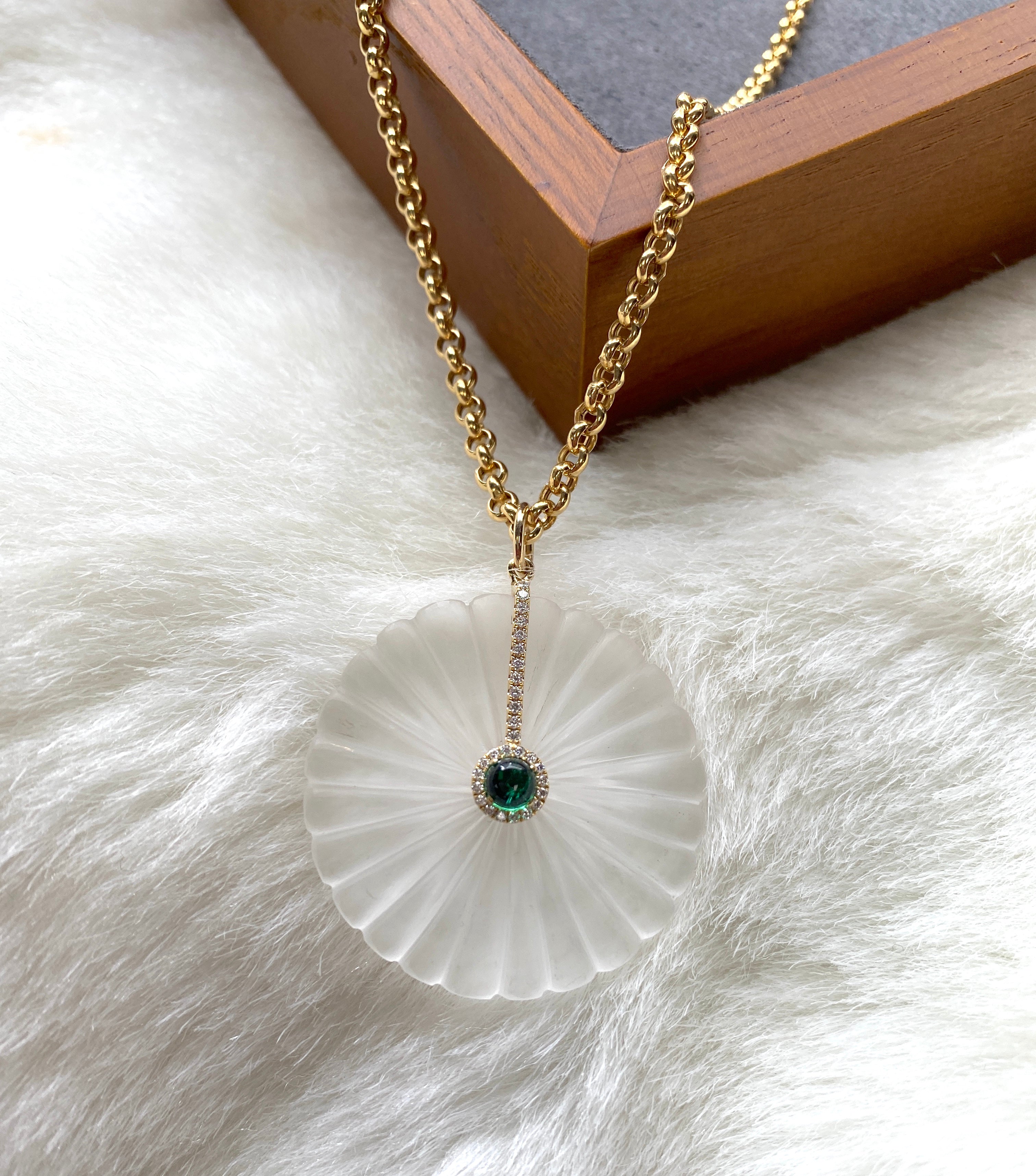 Carved diamond and emerald pendant with 18 karat gold chain by fine jewelry designer Goshwara