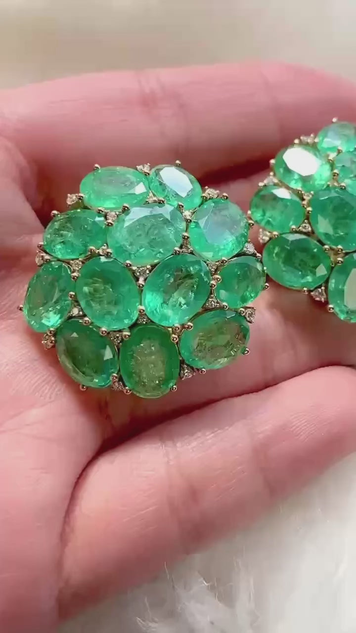 Emerald cluster earring with diamonds by fine jewelry designer Goshwara.