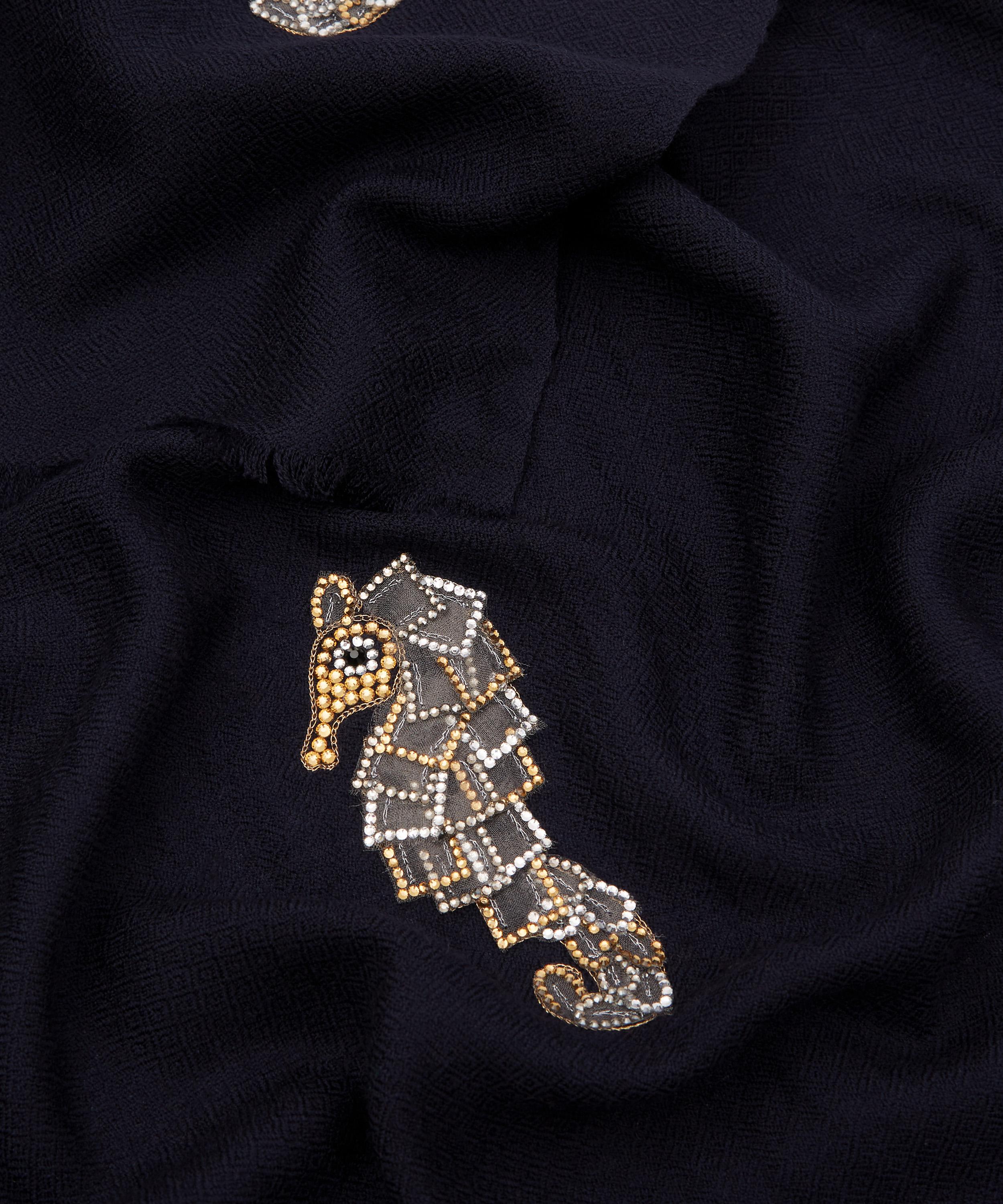 Hand-embroidered navy merino wool scarf with seahorse motif by JANAVI INDIA