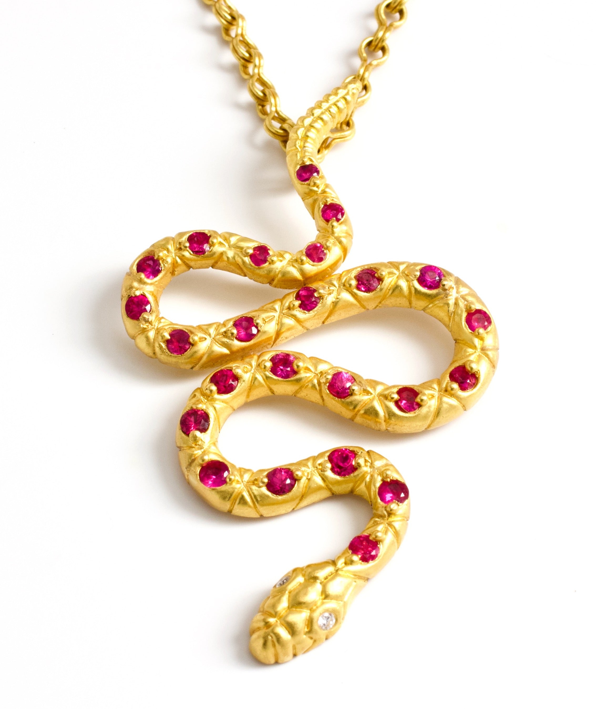 22 karat gold necklace with ruby snake pendant by jewelry designer Linda Hoj