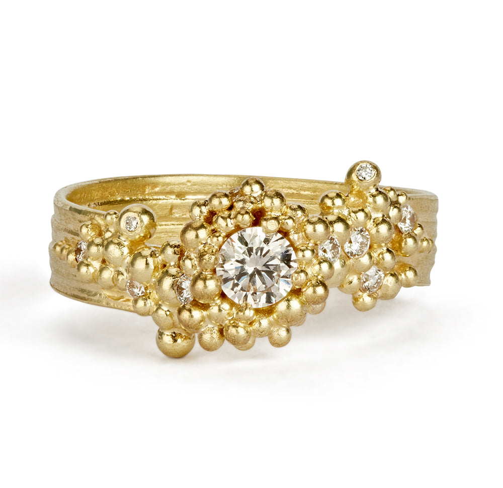 18 carat gold and diamond whorl ring by fine jewelry designer Hannah Bedford