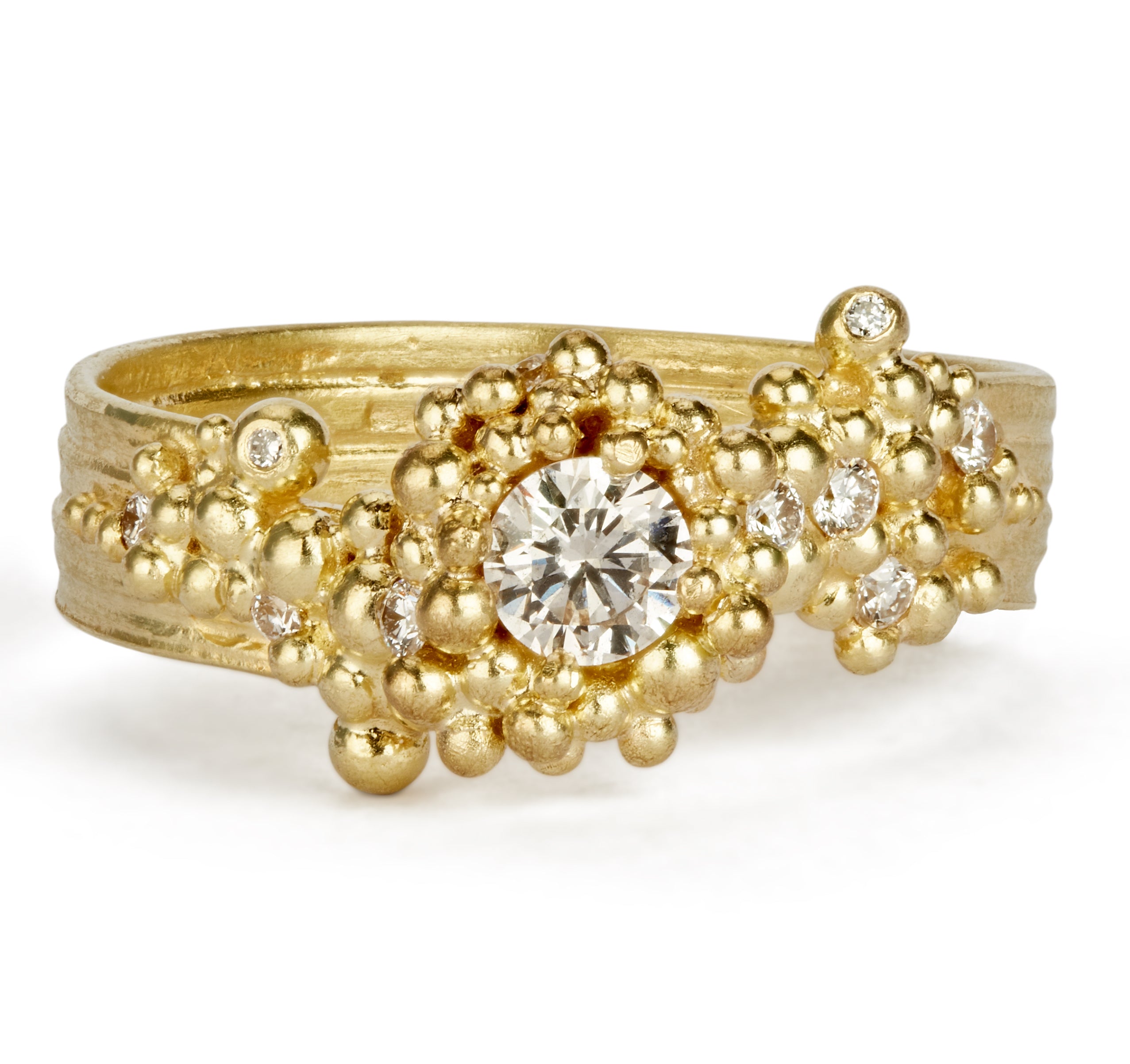 18 carat gold and diamond whorl ring by fine jewelry designer Hannah Bedford
