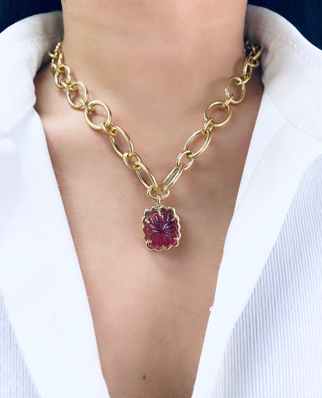 Pink tourmaline pendant with 18 karat gold chain by fine jewelry designer Goshwara