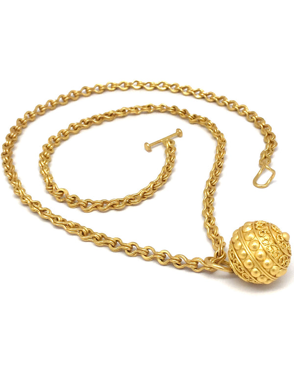 Ball pendant and chain in 22 karat gold necklace by fine jewelry designer Linda Hoj