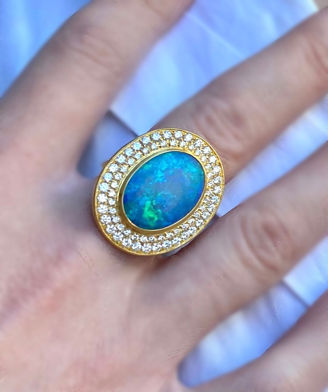 22 karat gold ring with large natural Australian opal and Diamonds by fine jewelry designer Linda Hoj