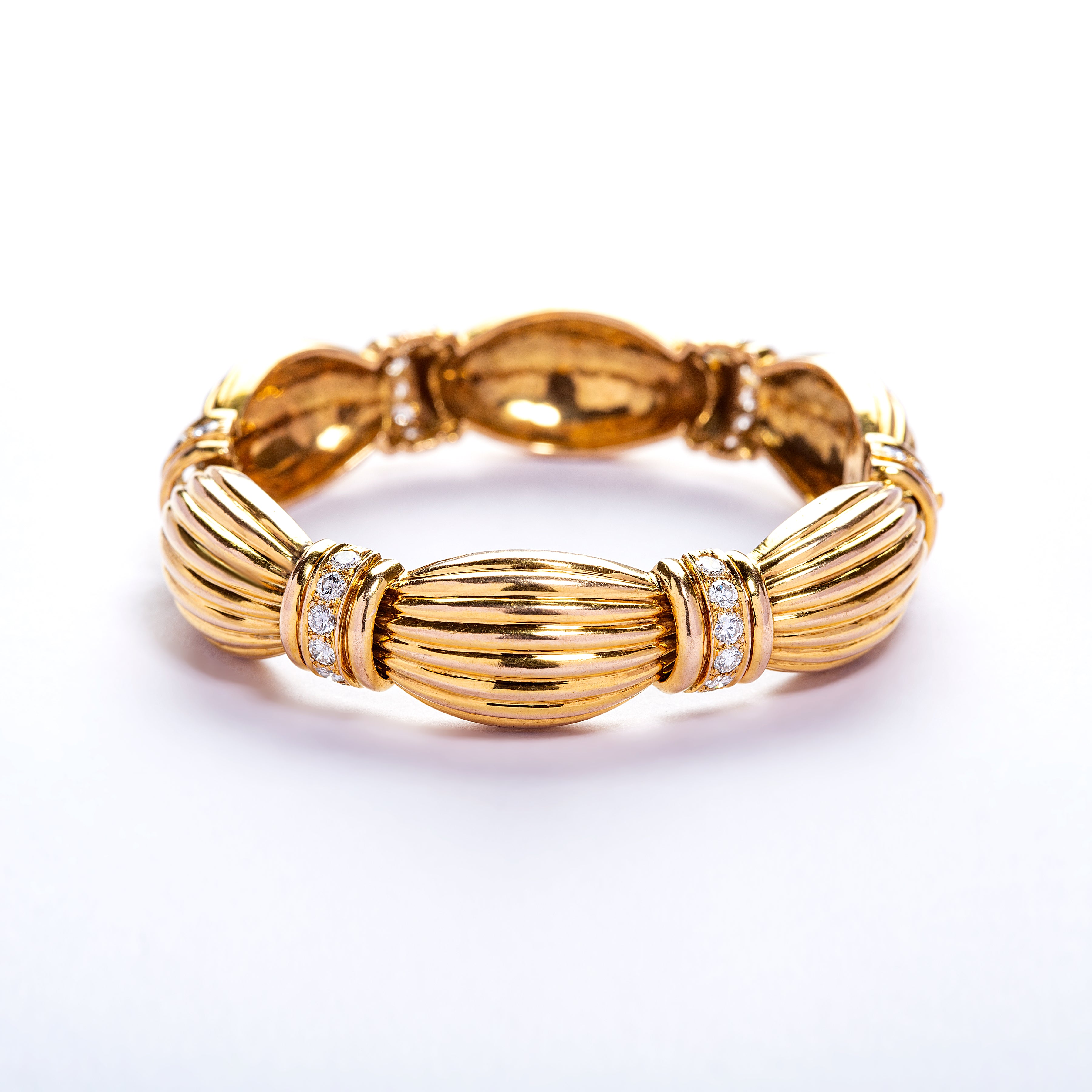 18 karat Gold Ribbon Bracelet with Diamonds by fine jewelry designer ESTAA