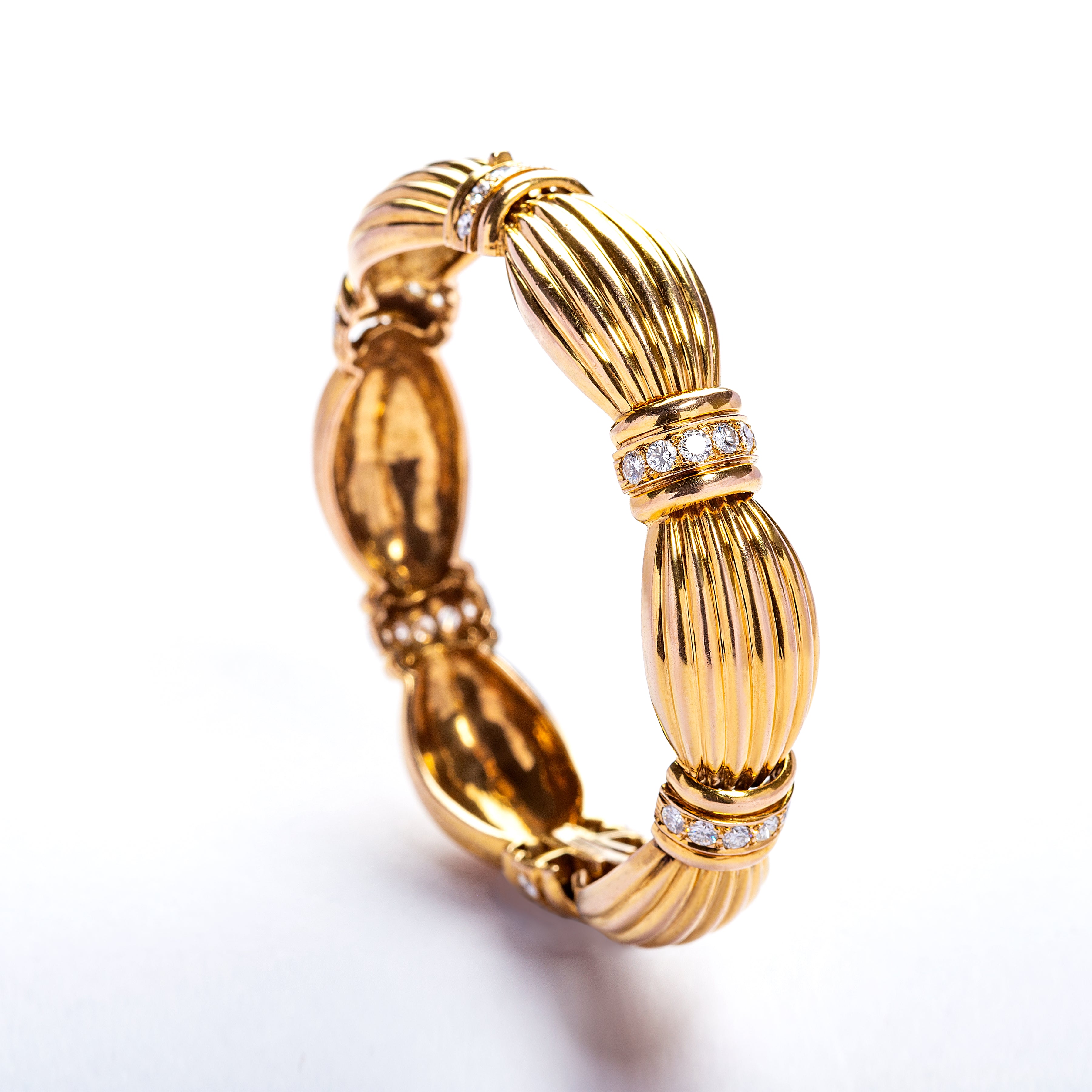 18 karat Gold Ribbon Bracelet with Diamonds by fine jewelry designer ESTAA