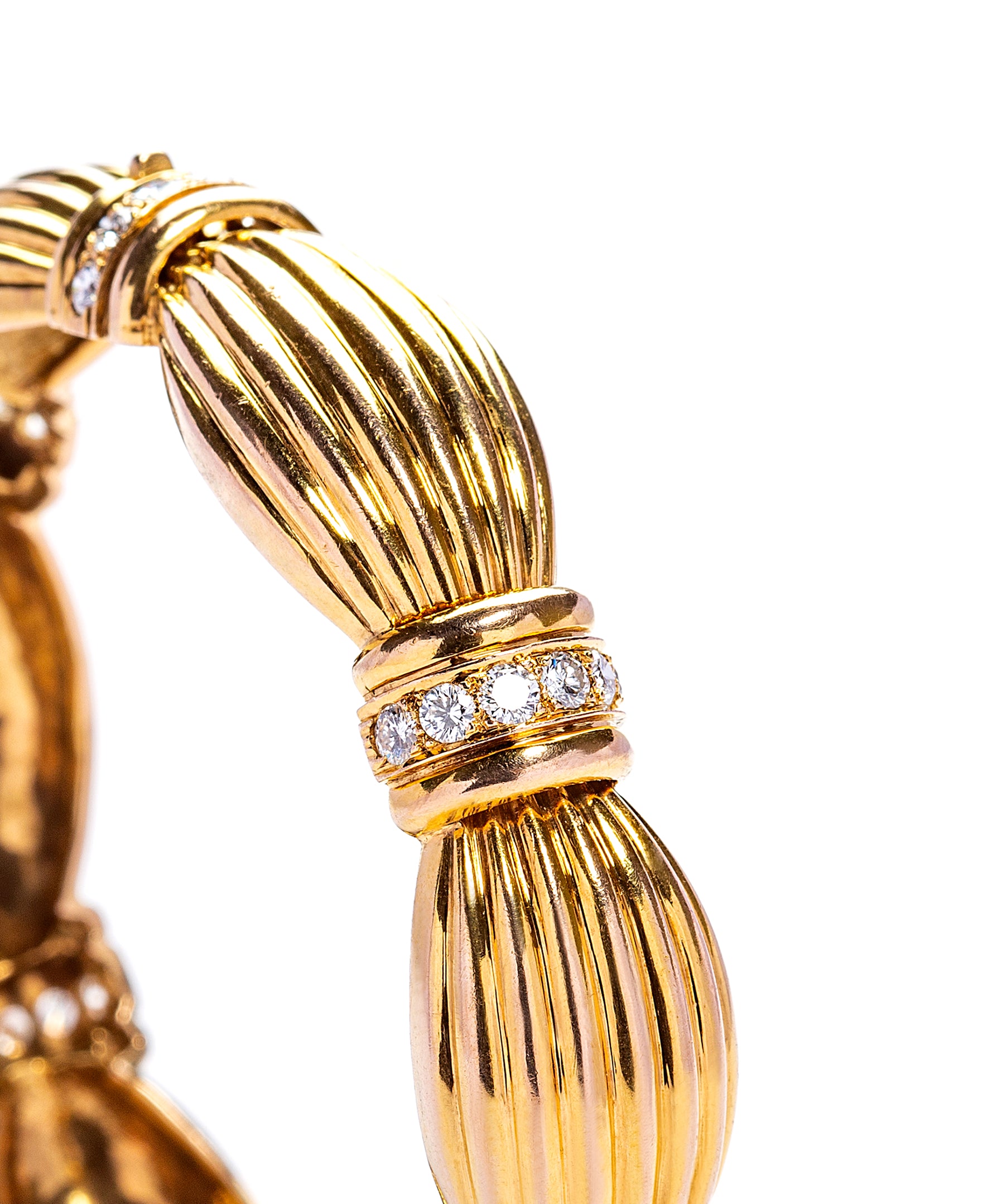 18 karat Gold Ribbon Bracelet with Diamonds by fine jewelry designer ESTAA