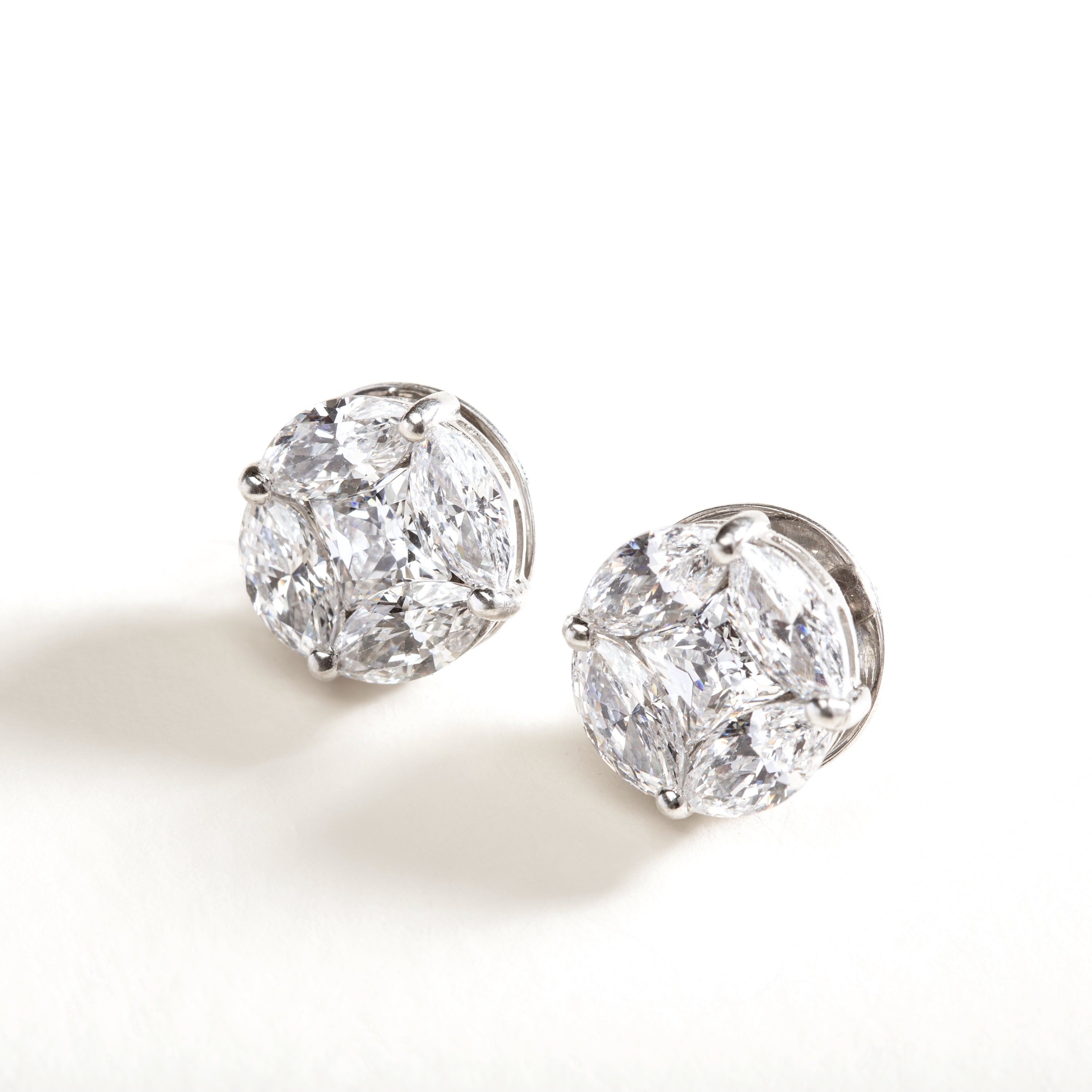 18 karat white gold and 16 carat diamond stud earrings by fine jewelry designer ESTAA