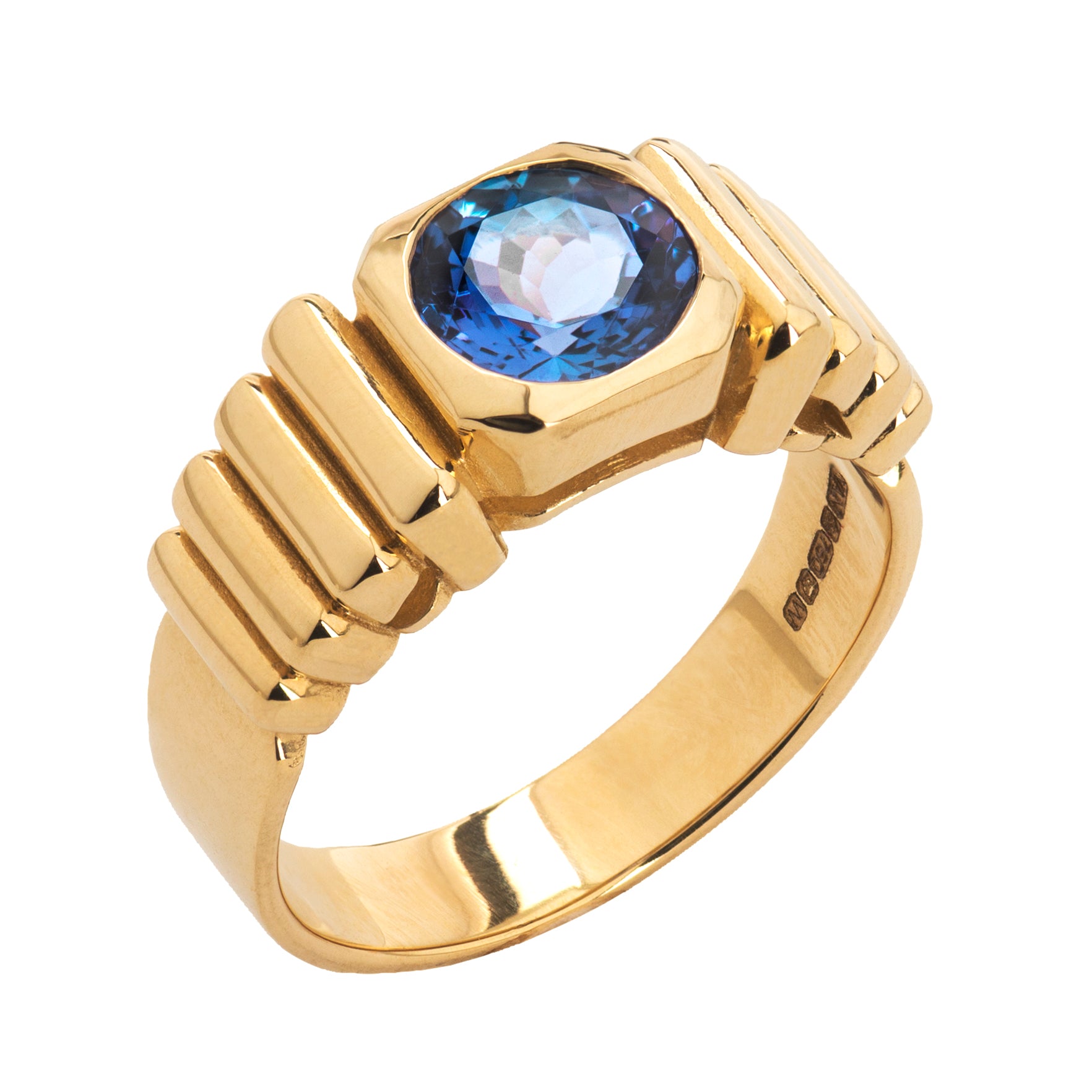 18 karat yellow gold tanzanite ring by fine jewelry designer Tatiana Van Lancker