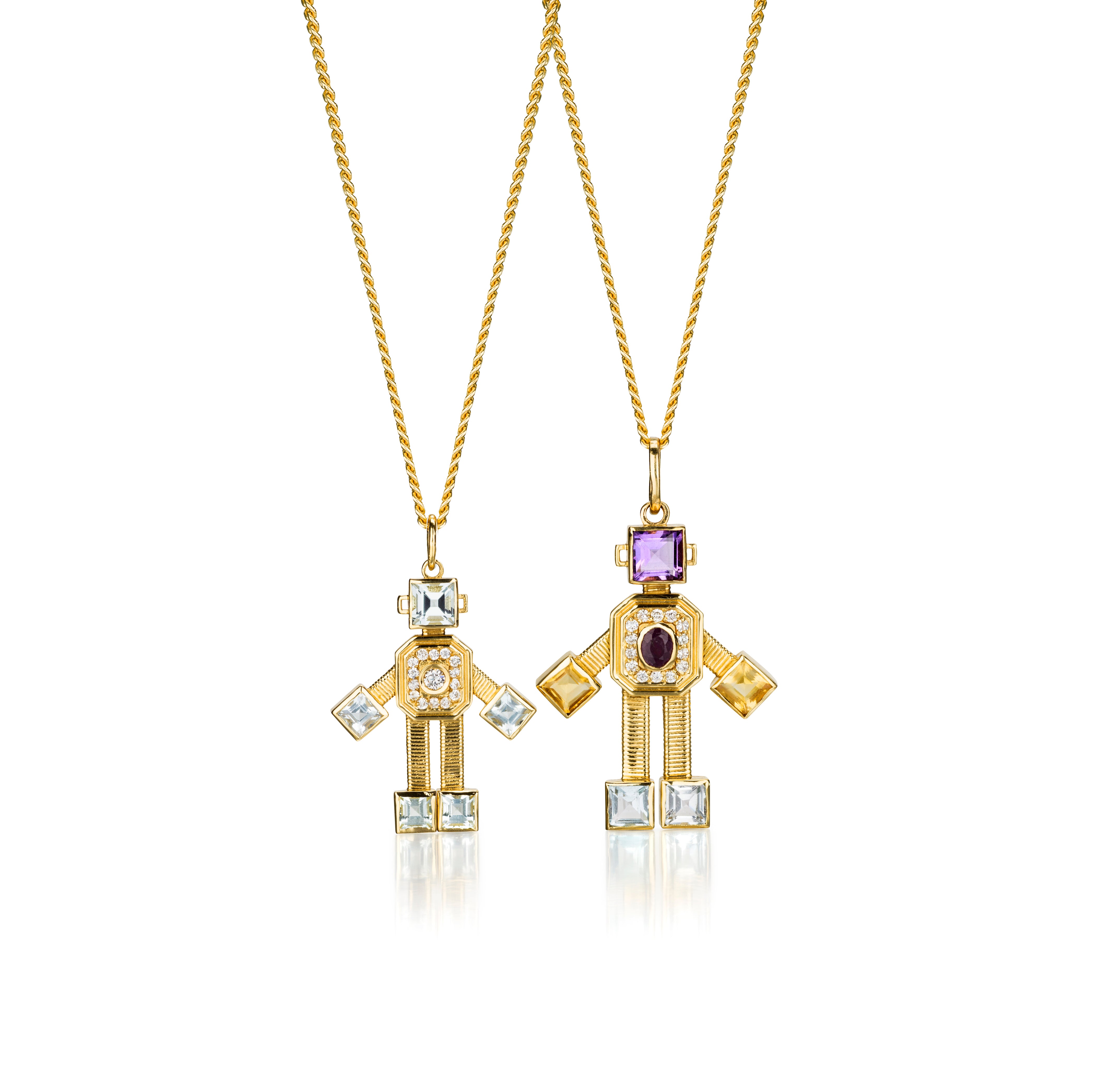 18 karat yellow gold articulated small robot pendant by fine jewelry designer Tatiana Van Lancker
