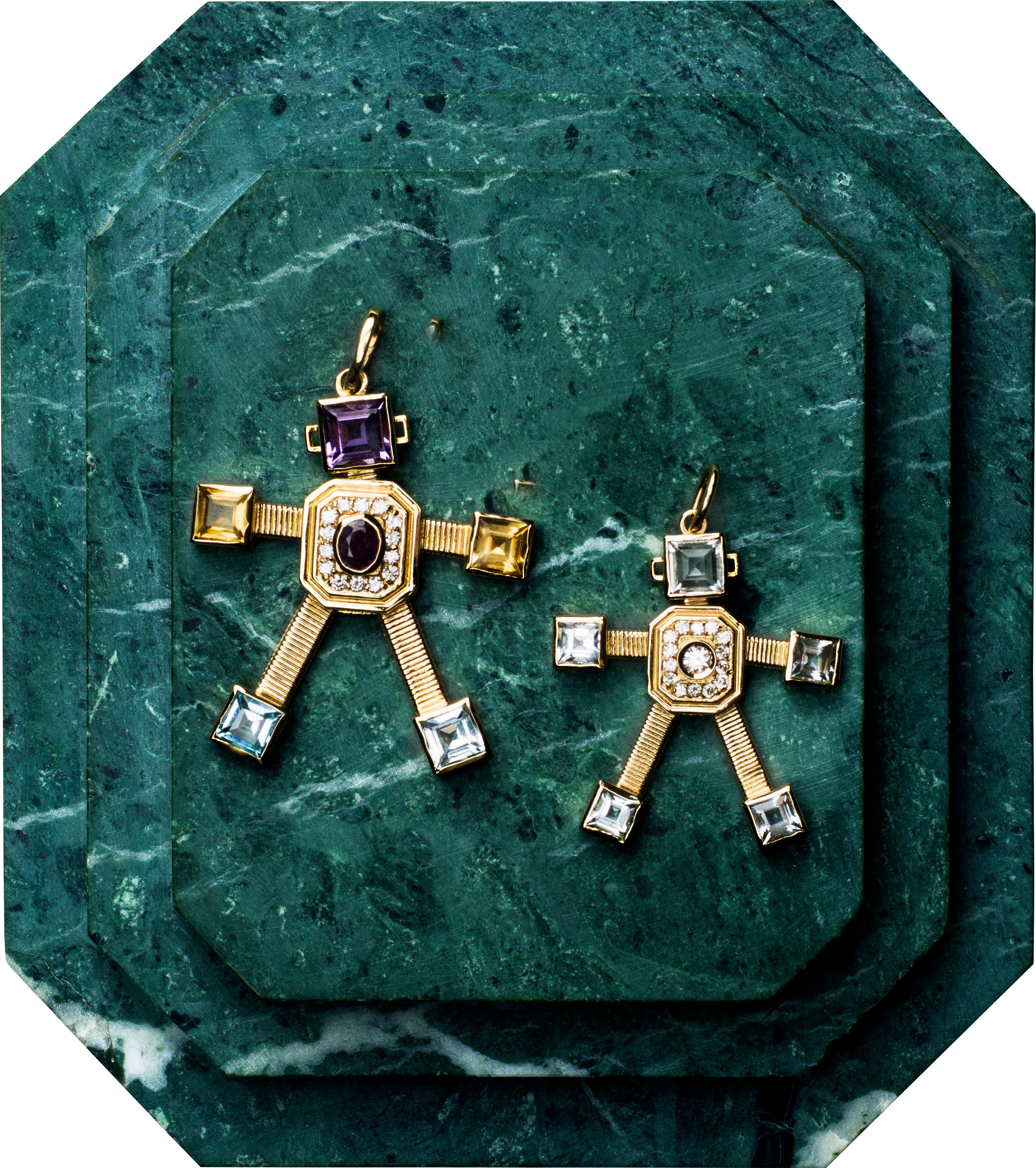 18 karat yellow gold articulated small robot pendant by fine jewelry designer Tatiana Van Lancker