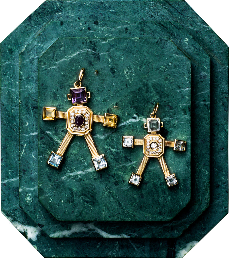 18 karat yellow gold articulated small robot pendant by fine jewelry designer Tatiana Van Lancker