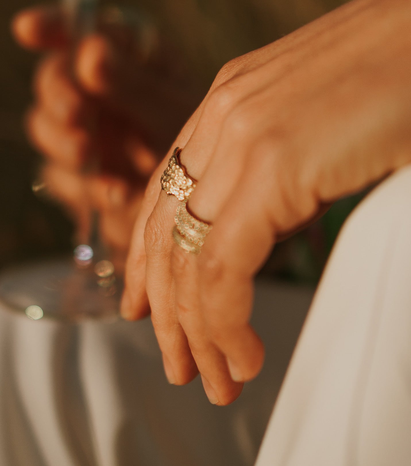 Gold textured dragon scale ring by jewelry designer-maker Clio Saskia