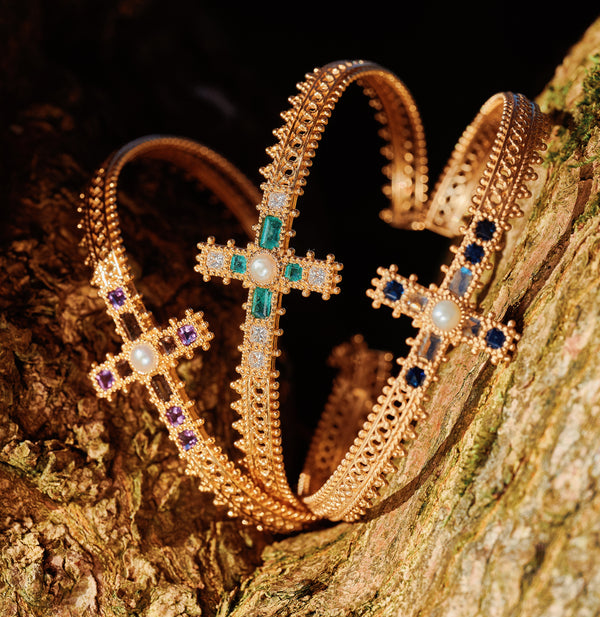 Jade Jagger jewelry Emerald cross bangle with pearls and diamonds