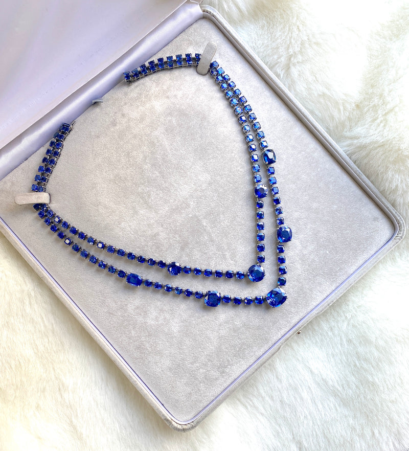 White gold blue sapphire necklace by fine jewelry designer Goshwara