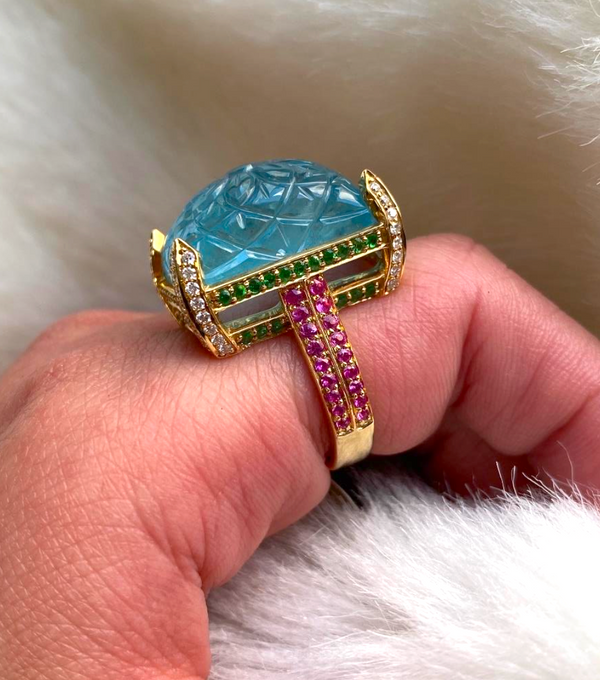 Aquamarine 18 karat gold ring with Tsavourite and Pink Sapphire by fine jewelry designer Goshwara
