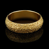 Chunky gold textured speckled ring by jewelry designer-maker Clio Saskia