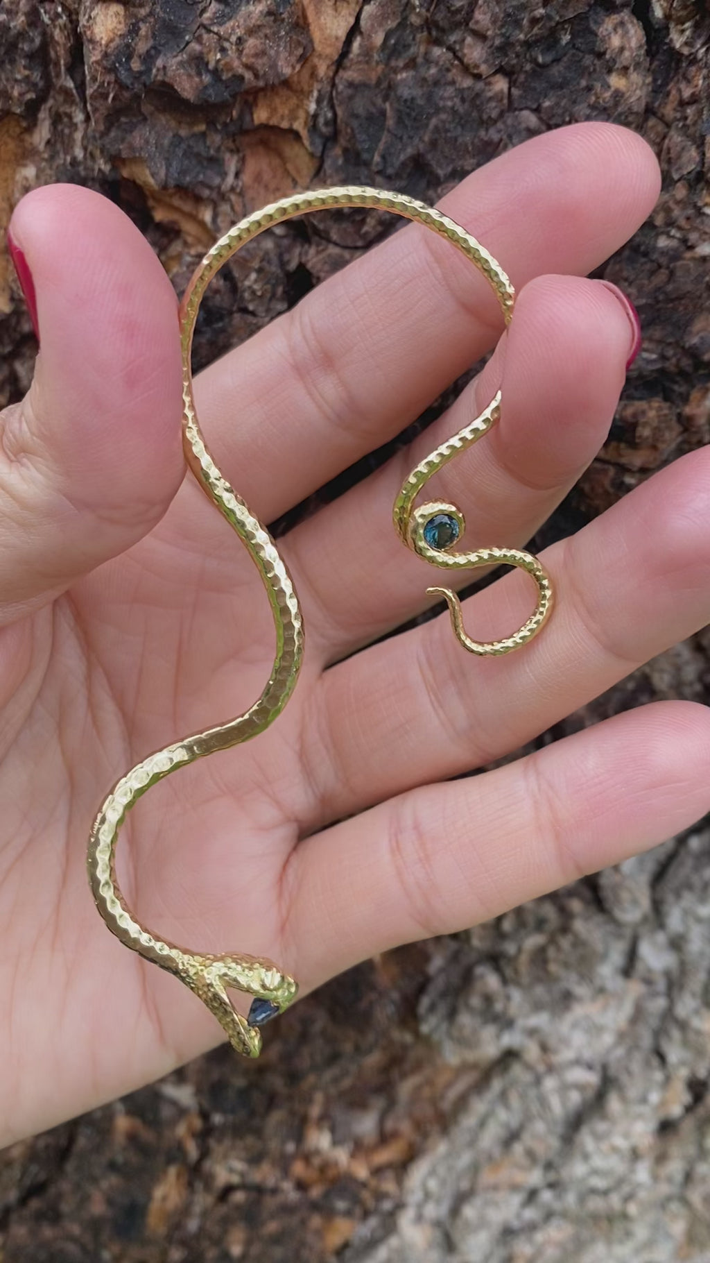 Sapphire gold snake ear cuff by jewelry designer Clio Saskia