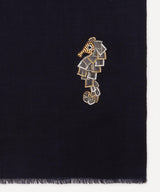 Hand-embroidered navy merino wool scarf with seahorse motif by JANAVI INDIA