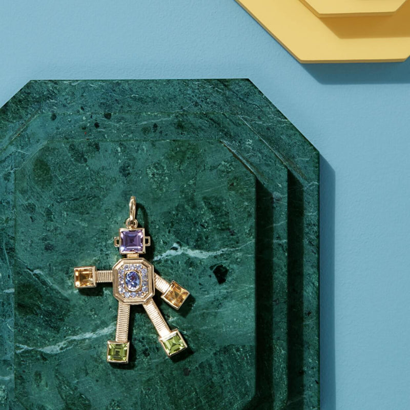 18 karat yellow gold articulated robot pendant by fine jewelry designer Tatiana Van Lancker