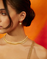 18 karat gold mandala petal necklace by fine jewelry designer Orly Marcel