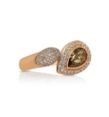 18 karat rose gold brown and white diamond ring by fine jewelry house Yael Designs.