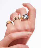 18 karat yellow gold blue topaz ring with diamonds and black enamel by fine jewelry house Van Den Abeele