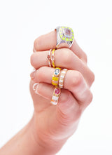 18 karat gold ring with pink sapphire and white enamel by fine jewelry house Van Den Abeele