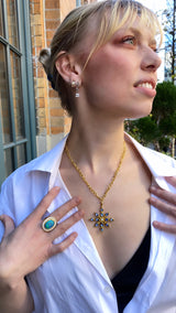 22 karat gold ring with large natural Australian opal and Diamonds by fine jewelry designer Linda Hoj