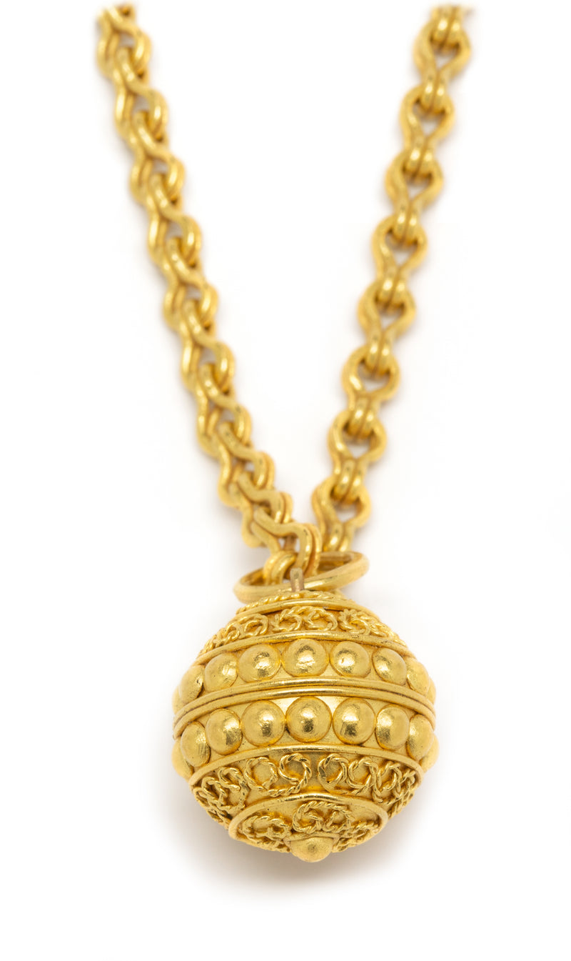 Ball pendant and chain in 22 karat gold necklace by fine jewelry designer Linda Hoj
