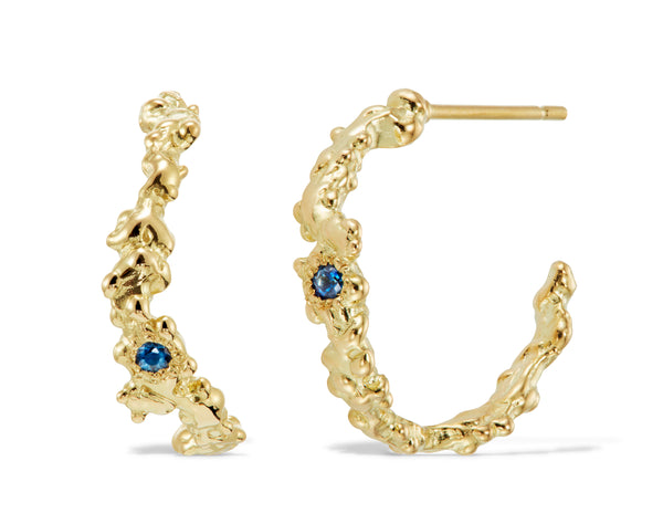 Gold and sapphire hoop earrings by jewelry designer-maker Clio Saskia