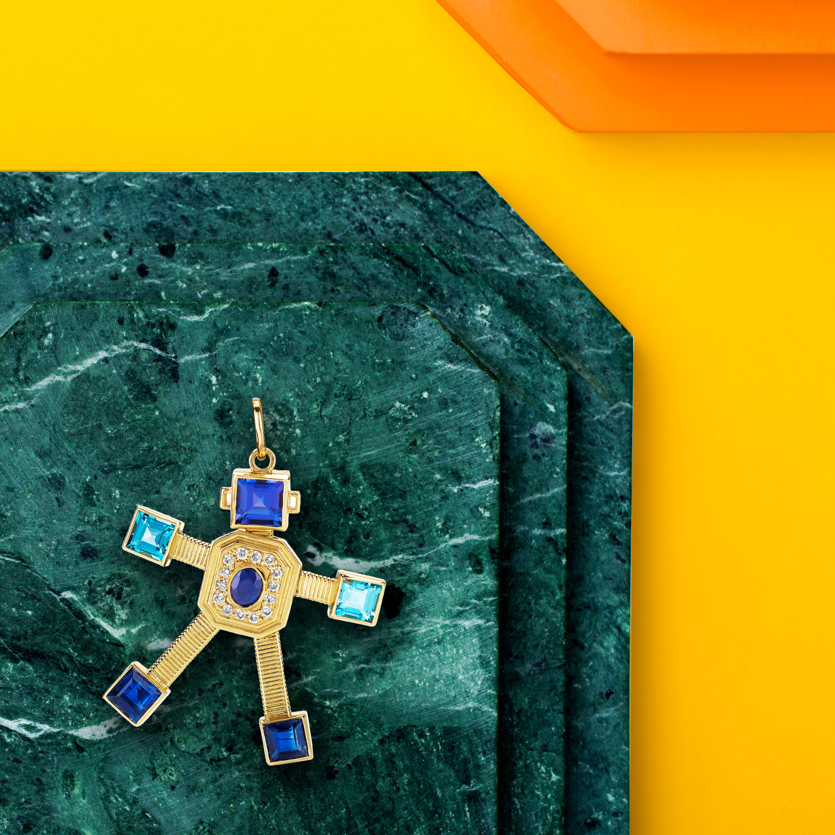 18 karat yellow gold articulated robot pendant by fine jewelry designer Tatiana Van Lancker, VAN