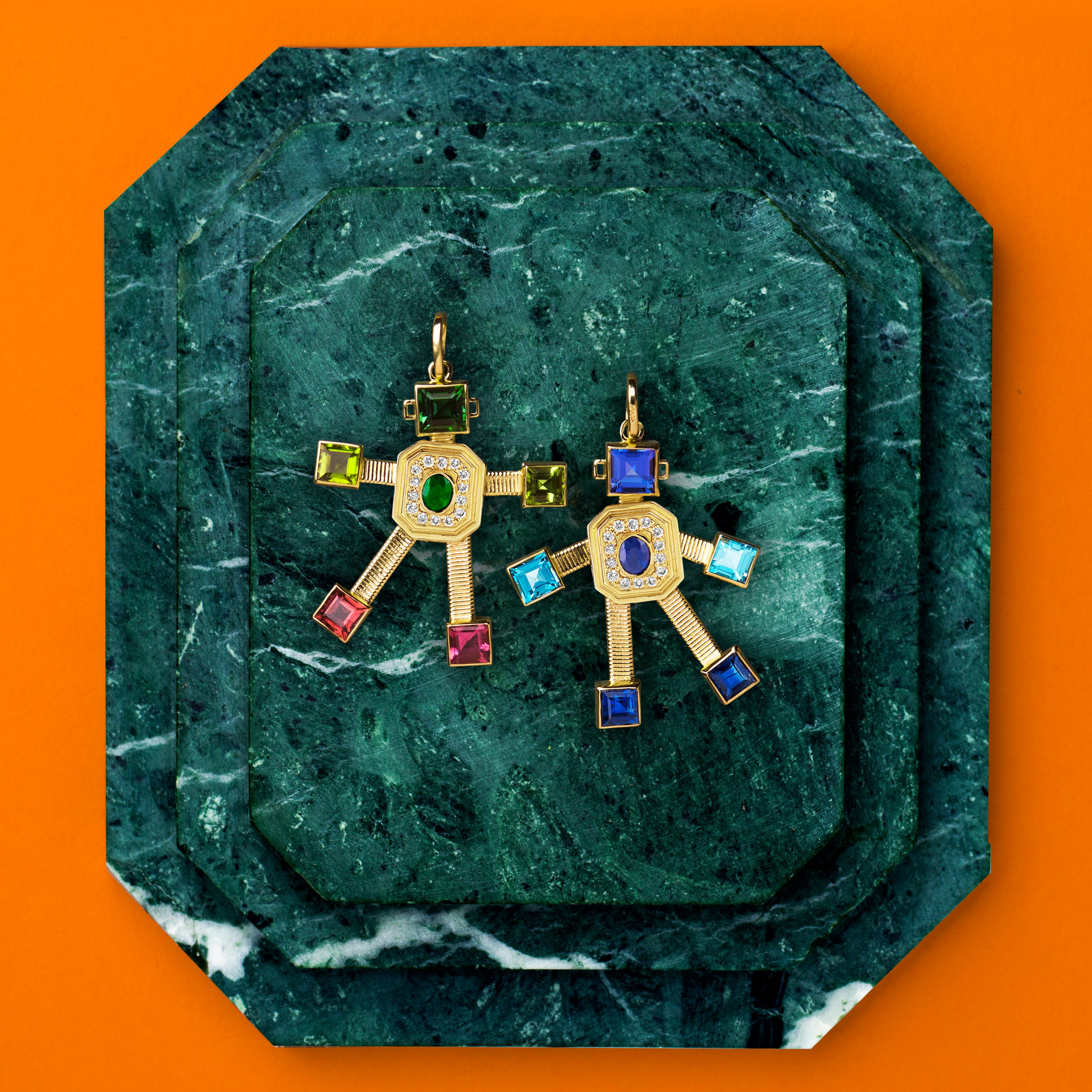 18 karat yellow gold articulated robot pendant by fine jewelry designer Tatiana Van Lancker