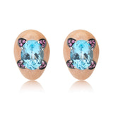  18 karat white gold blue topaz and pink sapphire earrings by American purveyor of haute joaillerie Andreoli