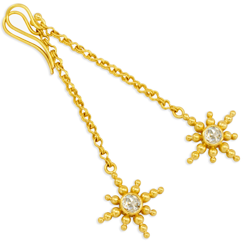 Diamond star drop earrings in 22 karat gold by fine jewelry designer Linda Hoj. 