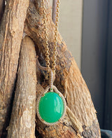 Chrysoprase and Diamond pendant with chain with 18 karat gold chain by fine jewelry designer Goshwara