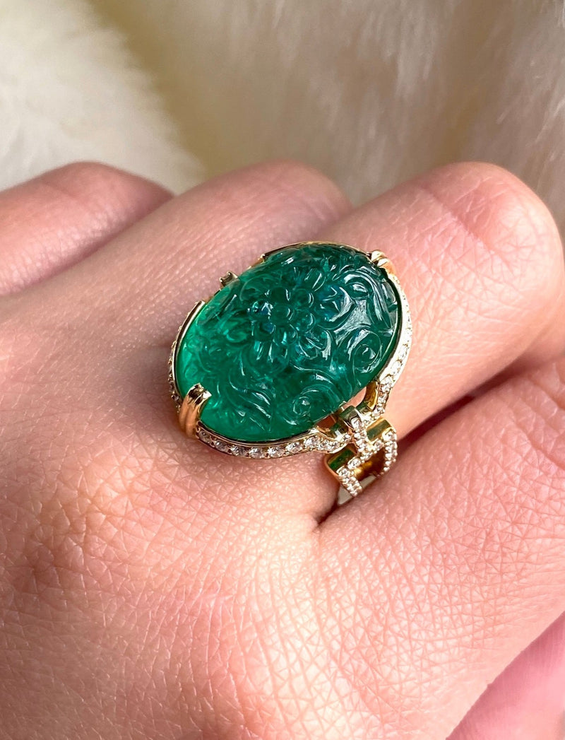 18 karat gold, carved Emerald ring with Diamonds by fine jewelry designer Goshwara