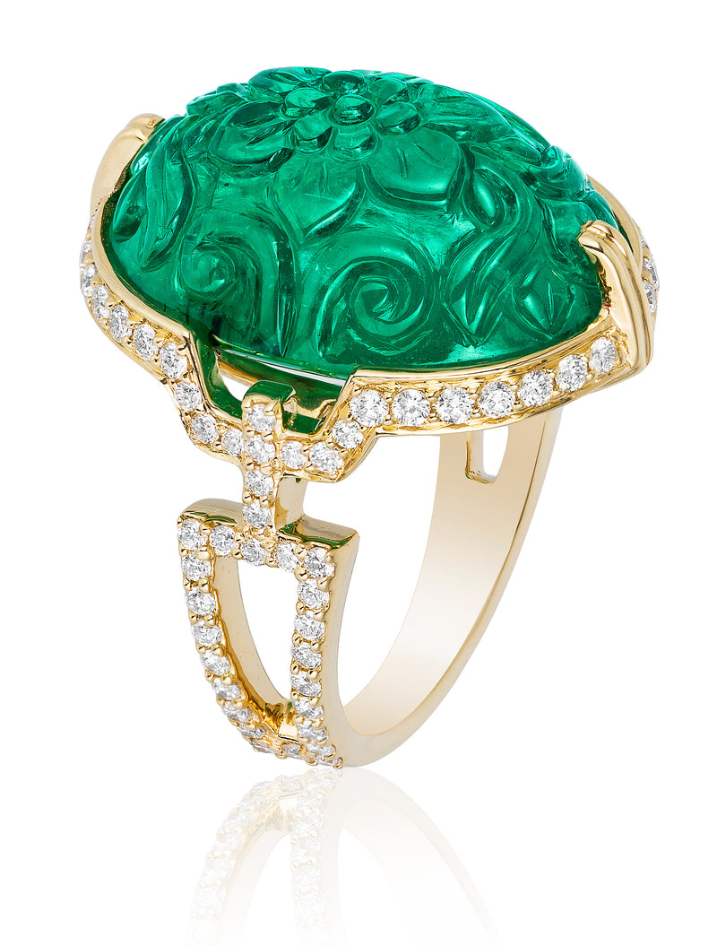 18 karat gold, carved Emerald ring with Diamonds by fine jewelry designer Goshwara.