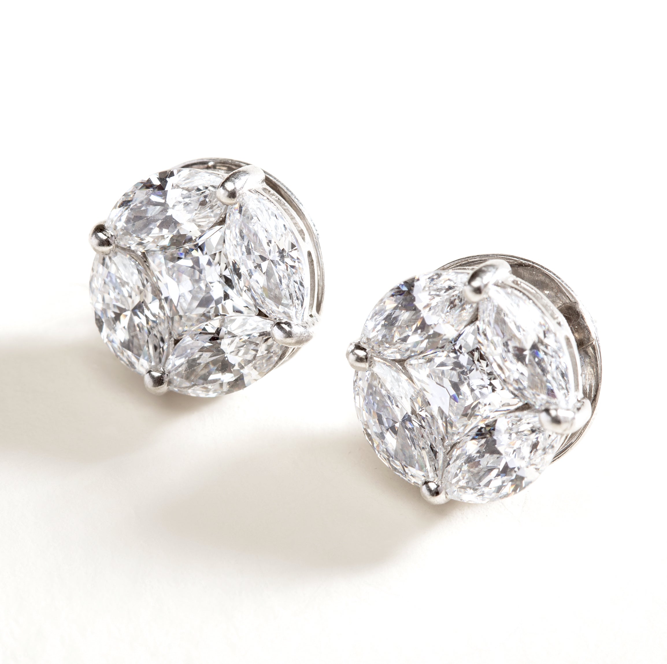 18 karat white gold and 16 carat diamond stud earrings by fine jewelry designer ESTAA