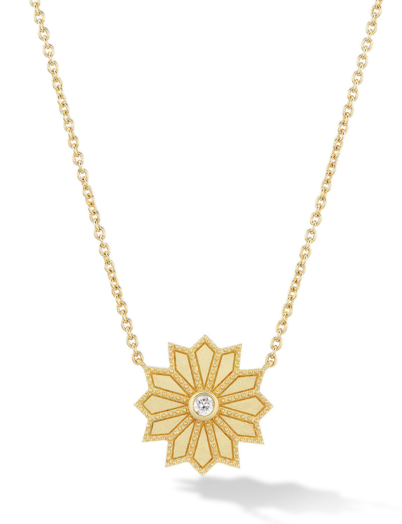 Mini sacred flower necklace by fine jewelry designer Orly Marcel