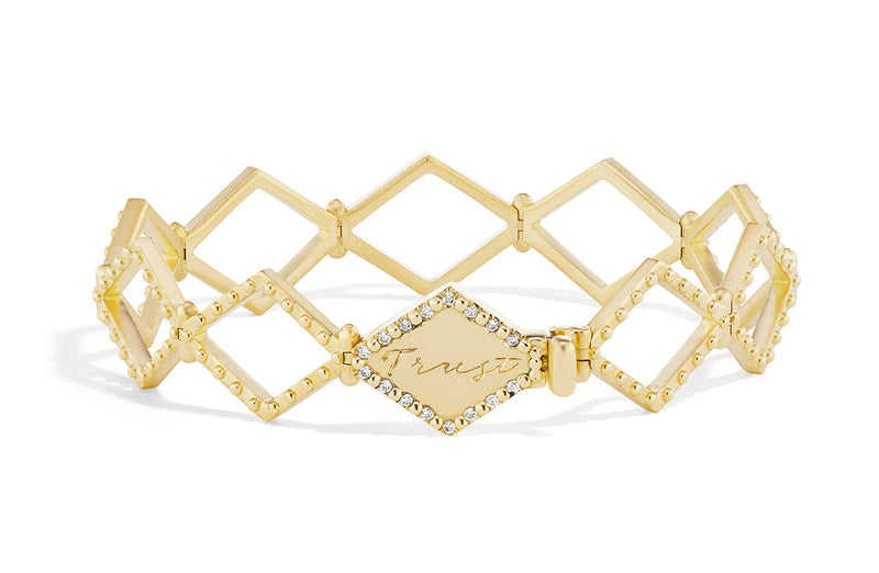 18 karat gold bracelet with message engraving  by fine jewelry designer Orly Marcel