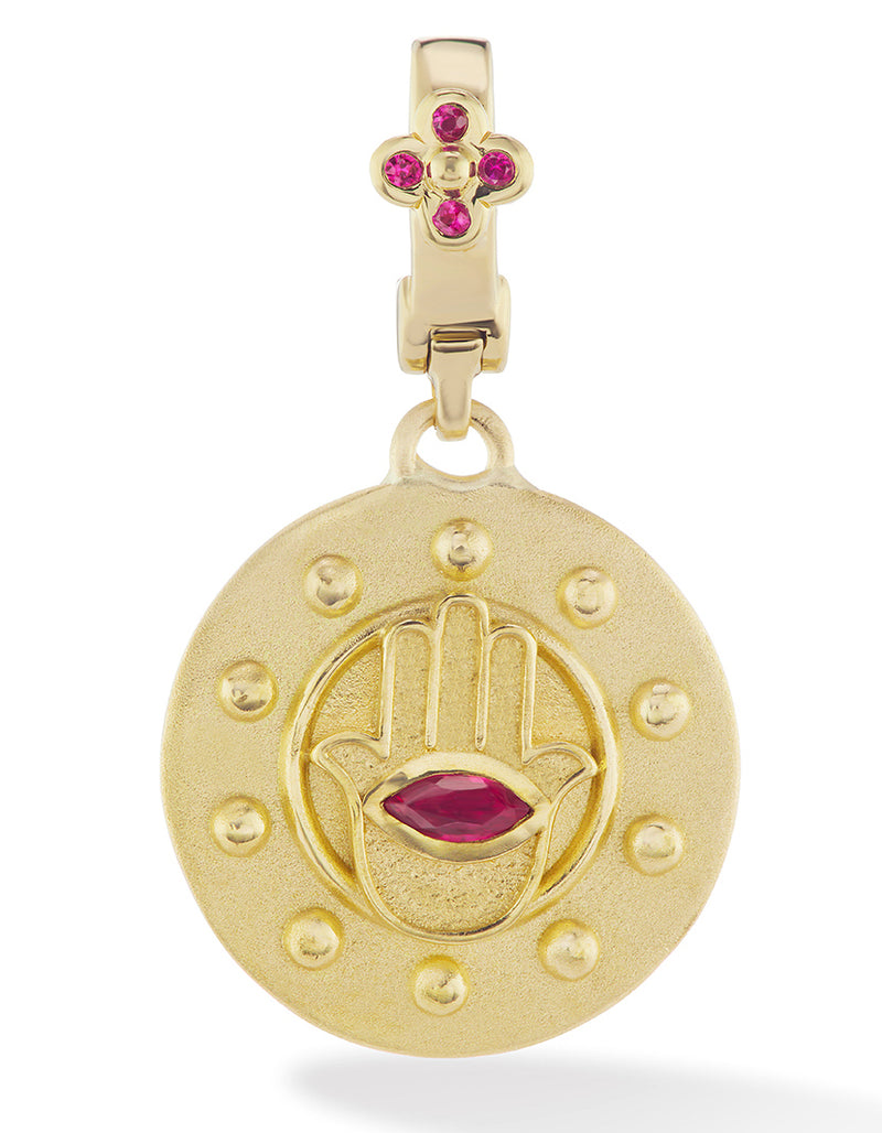 18 karat gold and ruby hamsa pendant by fine jewelry designer Orly Marcel