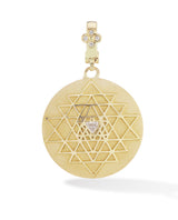18 karat gold diamond pendant by fine jewelry designer Orly Marcel. 