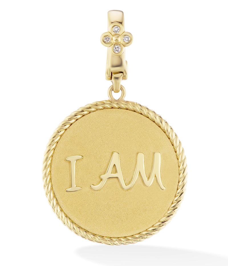 18 karat gold pendant with message engraving by fine jewelry design Orly Marcel.