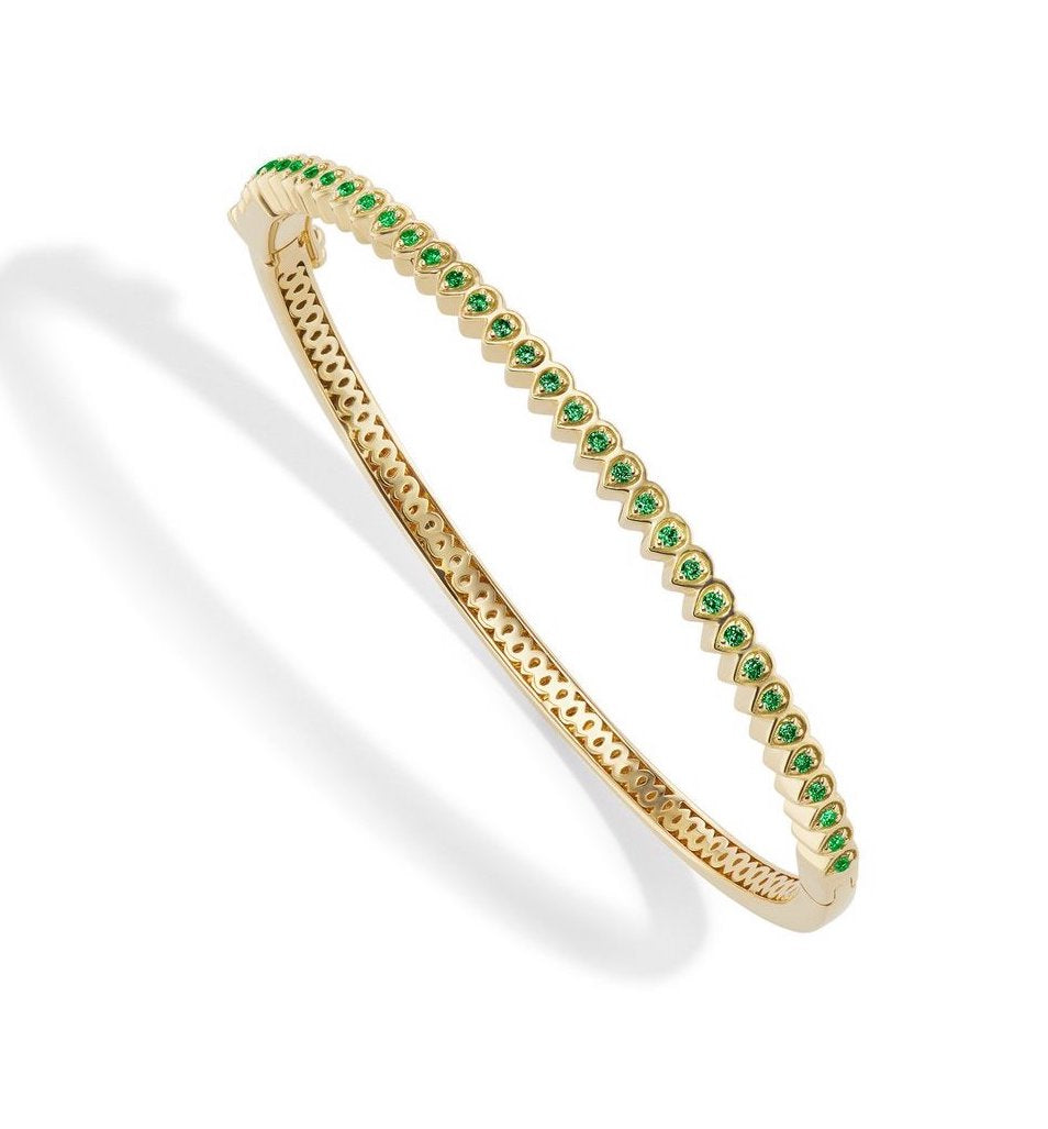 18 karat gold Mandala Petal Bangle with Emeralds by fine jewelry designer Orly Marcel