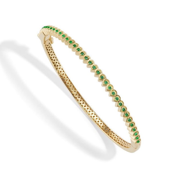 18 karat gold Mandala Petal Bangle with Emeralds by fine jewelry designer Orly Marcel