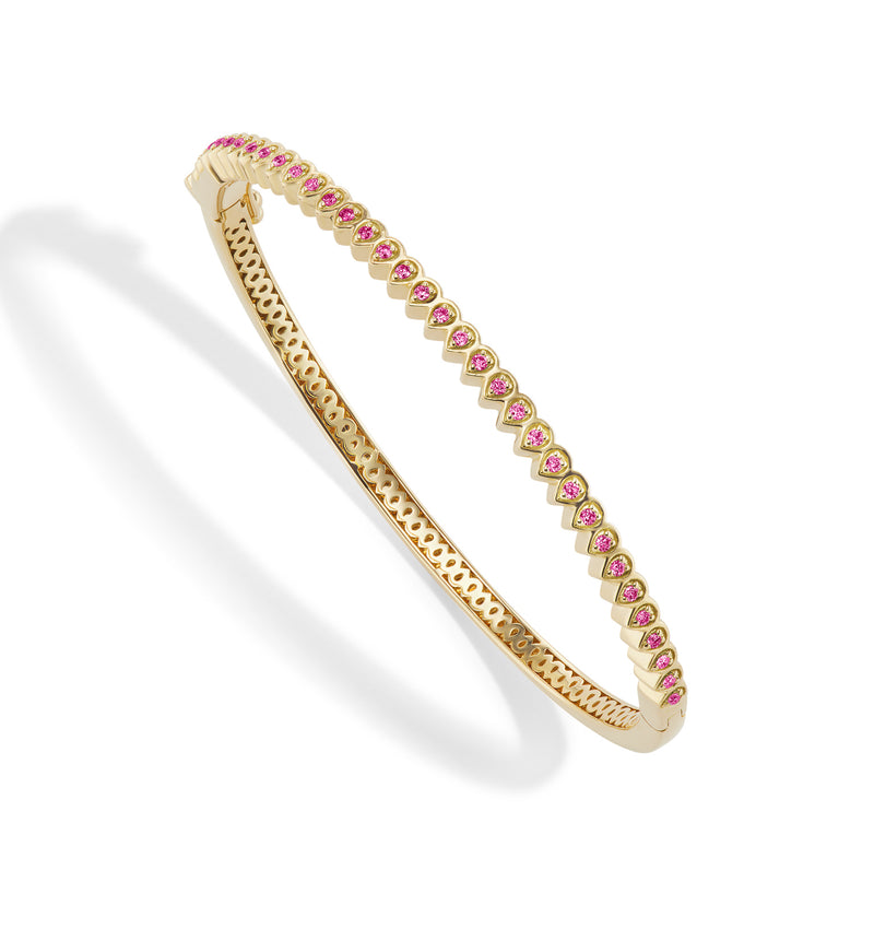 18 karat gold Mandala Petal Bangle with Pink Sapphire by fine jewelry designer Orly Marcel