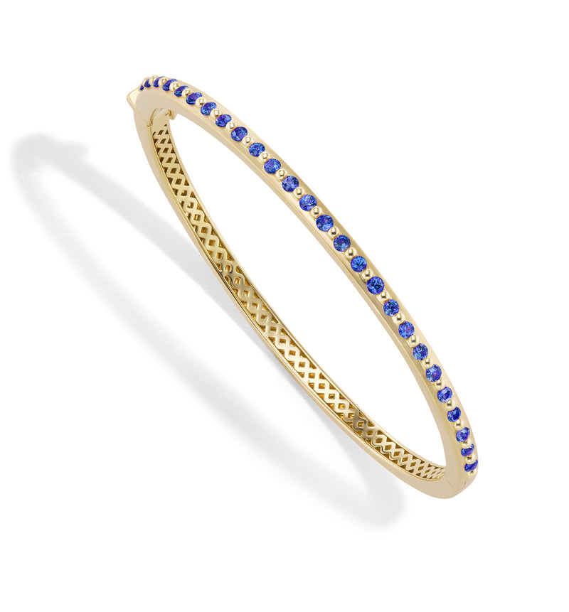 18 karat Yellow Gold and blue sapphires  bracelet by fine jewelry designer Orly Marcel